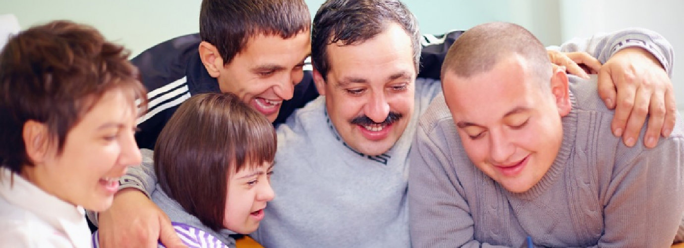 happy familiy watching on a pad